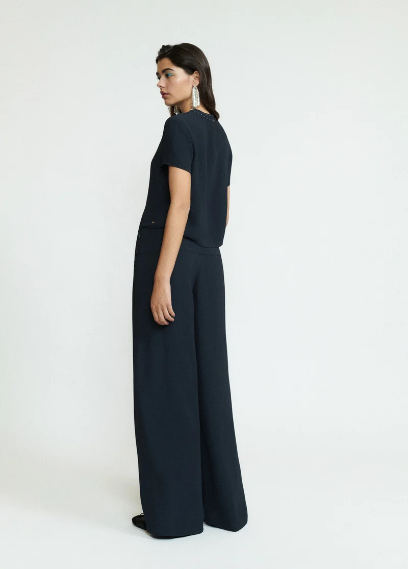 Long studded trousers