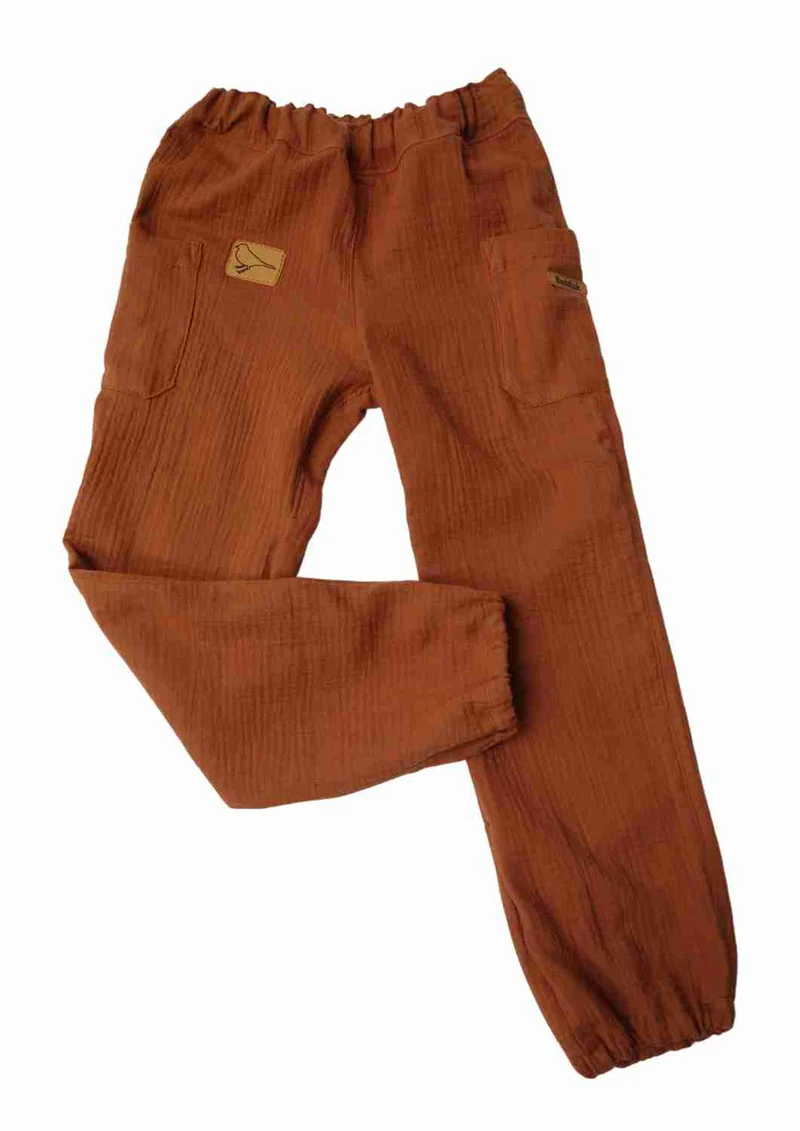 versandbereit Bio Musselinhose für Kinder "Birke" 122/128, terracotta