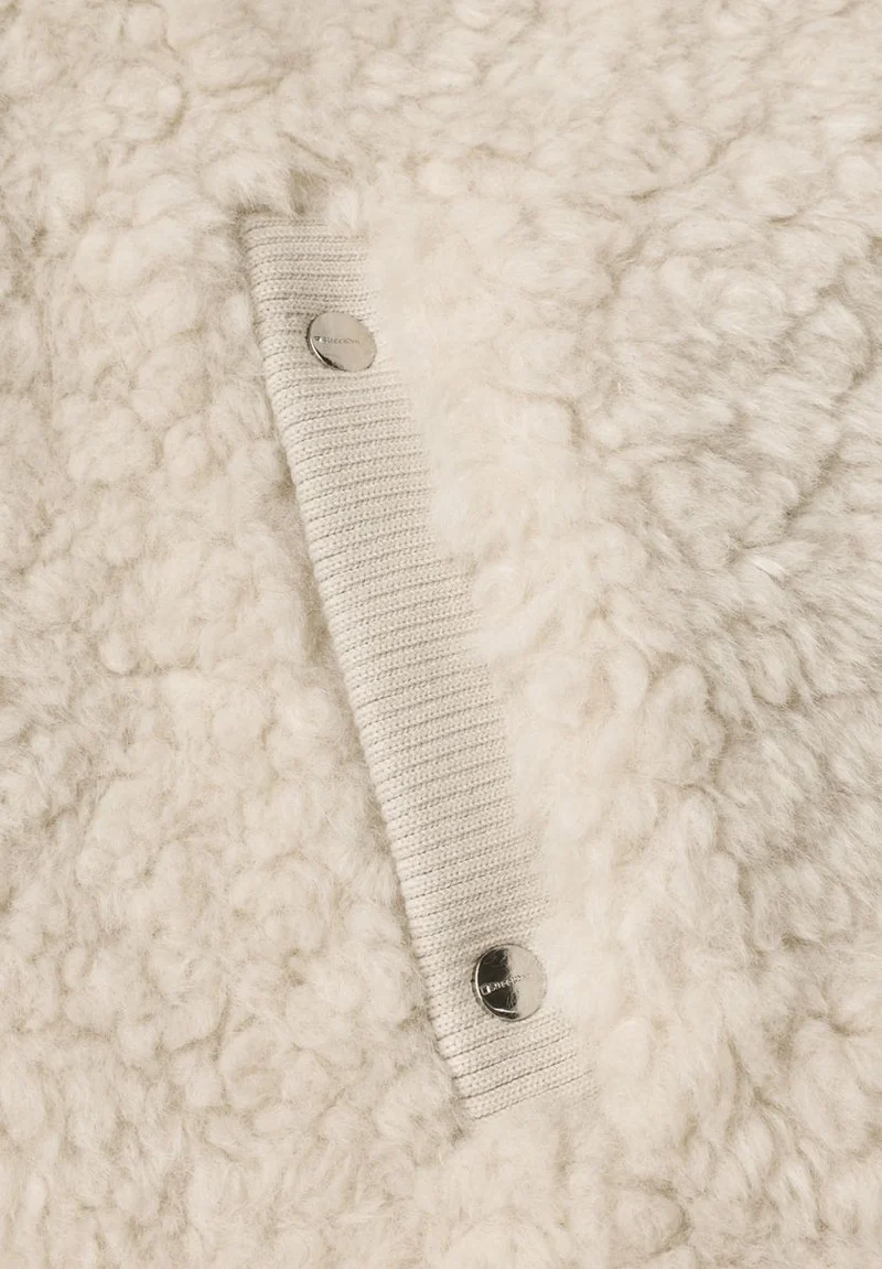 Fake Fur Weste mit Strickdetails