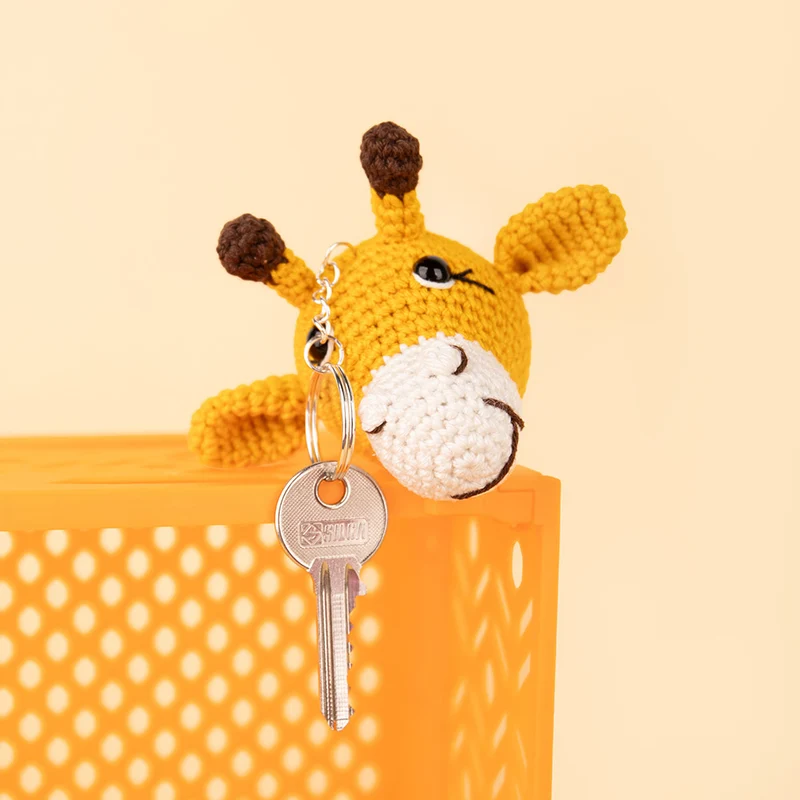 Schlüsselanhänger-Set mit 5 Figuren: Einhorn, kleiner Drache, Giraffe und Nilpferd – Sandra Bekx Häkelpaket