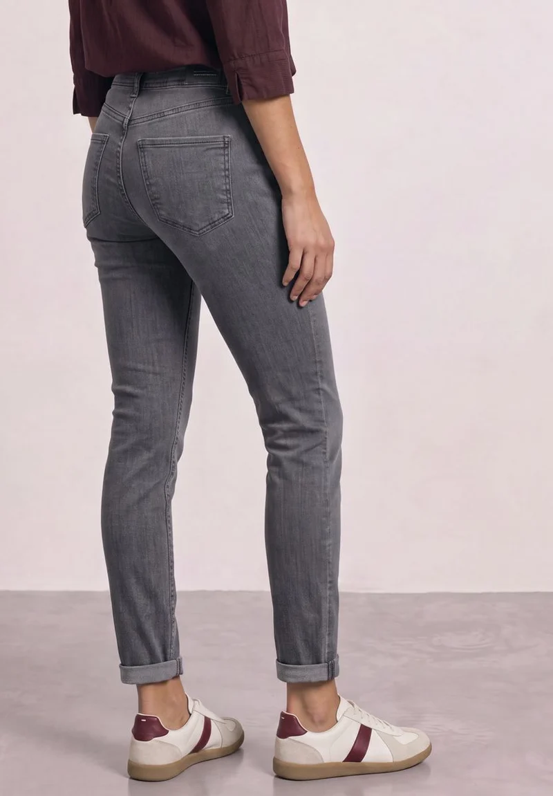 Mid Waist Slim Leg Jeans mit Dekodetail