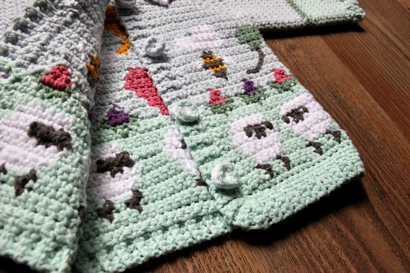 Häkelanleitung für eine Babyweste „Blümchen und Bären“ (digital)