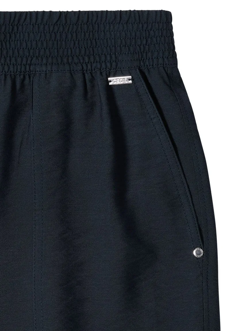 Mid Waist Slim Leg Hose im Loose Fit