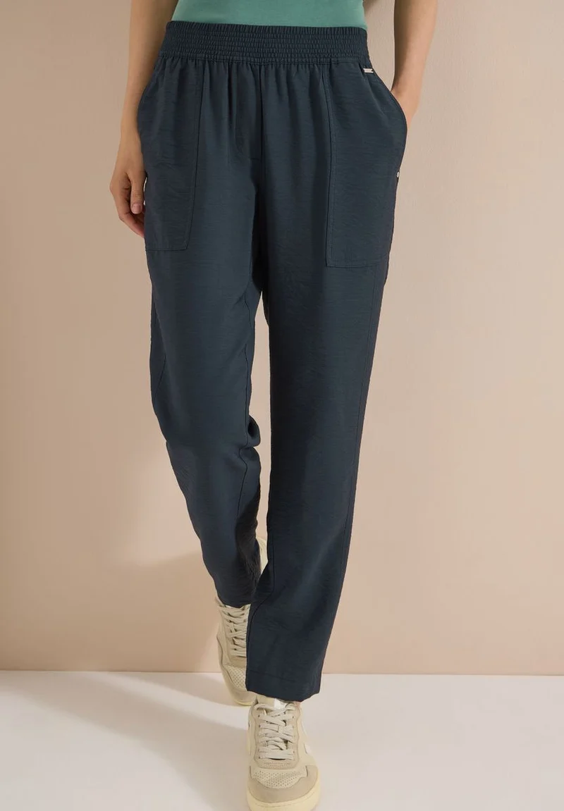 Mid Waist Slim Leg Hose im Loose Fit