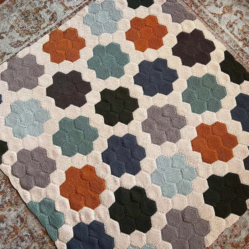 Strickanleitung für eine Blumen-Quiltdecke