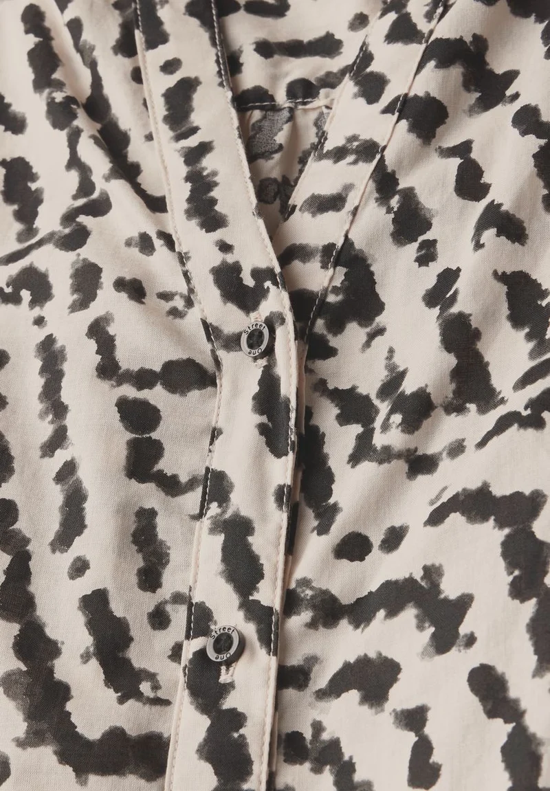 Print-Bluse mit Tapedetails