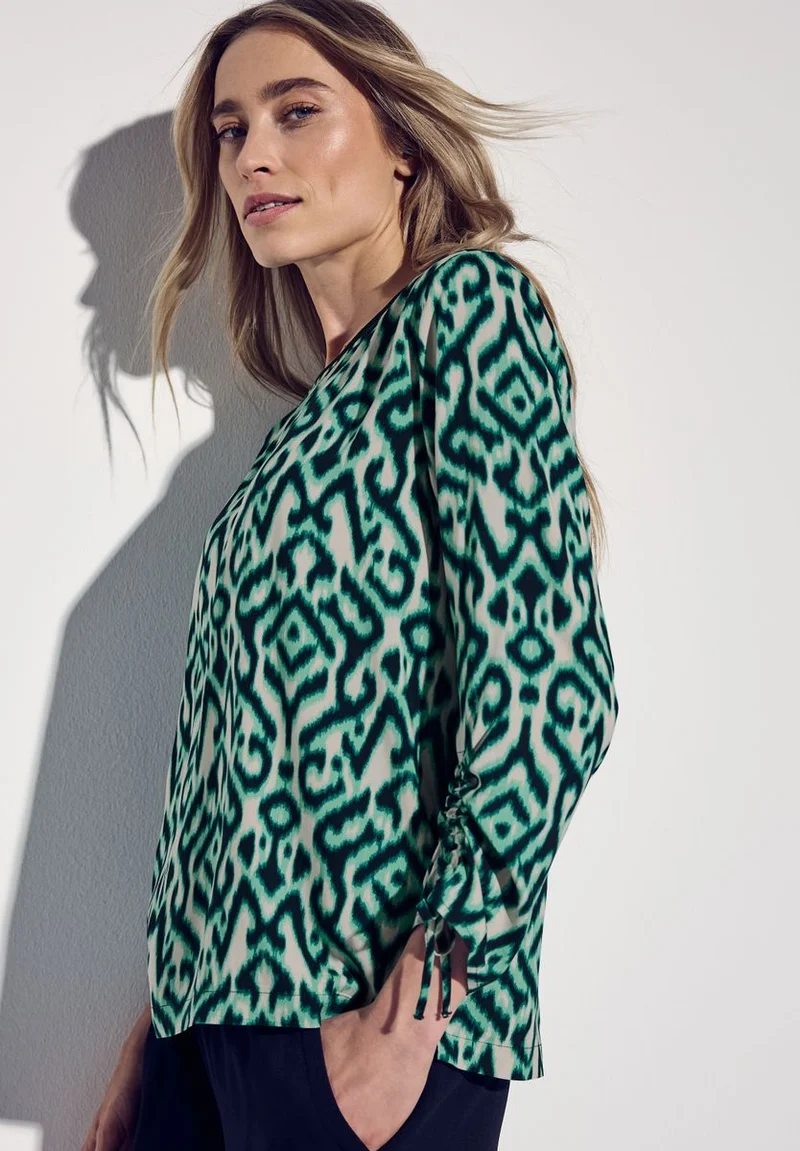 Bluse mit Raffung am Arm