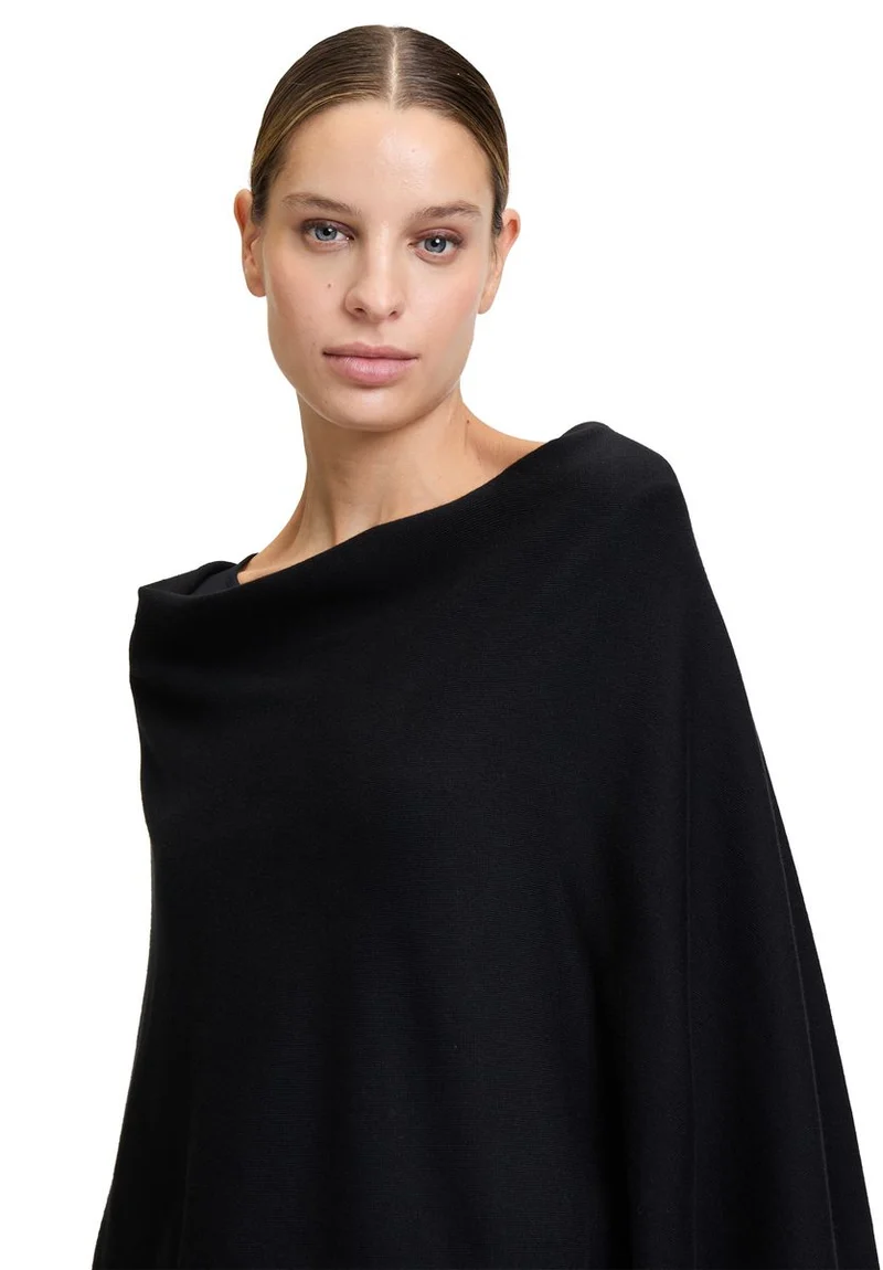 Strick-Poncho