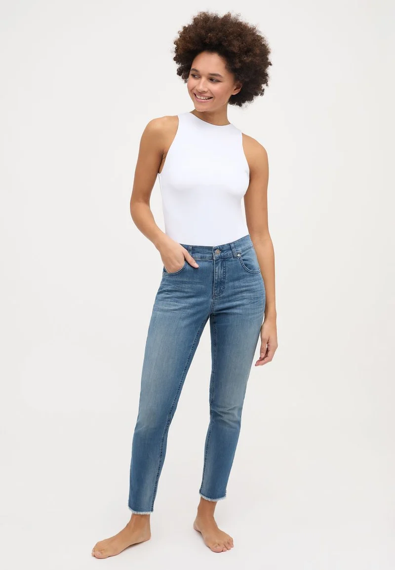 SKINNY ANKLE ZIP FRINGE